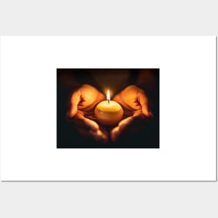 Small round candle burning held in hands Posters and Art